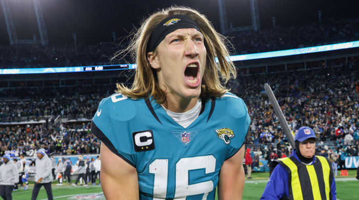 Jaguars quarterback Trevor Lawrence celebrates after beating the Los Angeles Chargers in the wild-card round